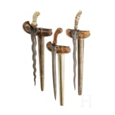 Three Indonesian kerises with handles of bone and wood, circa 1900