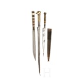 A small flyssa and two other North African knives, circa 1900