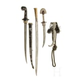 A North African yatagan and two daggers, 19th/20th century