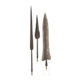Three African lance tips with a presentation stand