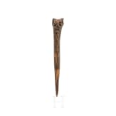 A Papua New Guinean carved bone dagger, 19th century