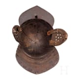 A German lobster-tailed helmet, circa 1630 and later