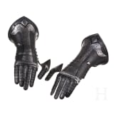 A pair of German black and white gauntlets, circa 1580