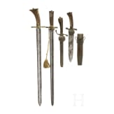 Four German and Austrian hunting hangers, 19th century