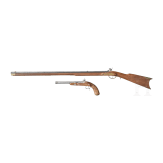 A percussion pistol and rifle, Italian replicas