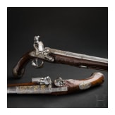 A magnificent pair of German chiselled flintlock pistols, circa 1780