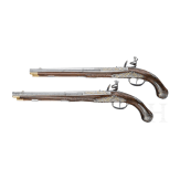 A magnificent pair of German chiselled flintlock pistols, circa 1780