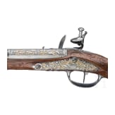 A magnificent pair of German chiselled flintlock pistols, circa 1780