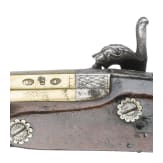 A cased pair of percussion pistols with brass barrels by Bennett in London, circa 1790