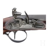 A flintlock pistol by E. Baker in London, circa 1810
