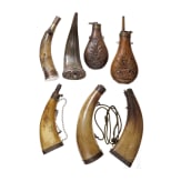 A small collection of European and Asian powder flasks, 19th century