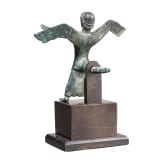 A Greek bronze statuette of Nike, 6th century B.C.