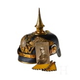 A helmet for Prussian One Year Guard Infantry volunteers, with shoulder boards and photo of owner