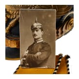 A helmet for Prussian One Year Guard Infantry volunteers, with shoulder boards and photo of owner
