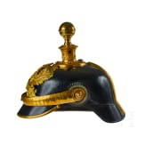 A helmet for Prussian Field Artillery Regiment 10 Officers with Colberg banner