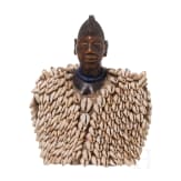 A Nigerian female twin figure (ere ibeji) of the Yewa in a cowry cloak, Nigeria, 20th century