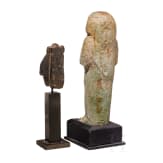A stone Osiris head with Atef crown and a ushabti made of faience with painted inscription, Late Period, mid-1st millennium B.C.