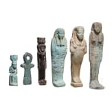 Five ancient Egyptian figures and an Ankh amulet, mostly faience, one figure made of stone, Late Period, mid-1st millennium B.C.