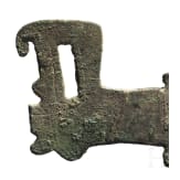 A Chinese flat bronze axe with animal head end, Western Zhou, 8th - 6th century B.C.