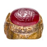 An ornate and gilt bronze ring with inscribed carnelian cabochon, Seljuk, 12th - 13th century