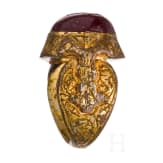 An ornate and gilt bronze ring with inscribed carnelian cabochon, Seljuk, 12th - 13th century