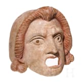 A Hellenistic terracotta theatre mask of the New Comedy, naive Ephebe type, 2nd century B.C.