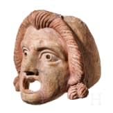 A Hellenistic terracotta theatre mask of the New Comedy, naive Ephebe type, 2nd century B.C.