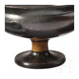 Two Greek bowls with handles made of black-glazed pottery, 4th century B.C.