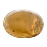 A Greek agate stone gem with Poseidon in biga drawn by two hippokamps, 4th century B.C.