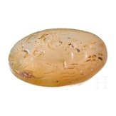 A Greek agate stone gem with Poseidon in biga drawn by two hippokamps, 4th century B.C.