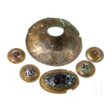 Six splendidly decorated, gilded Hellenistic bronze fittings, 3rd - 1st century B.C.