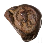Five impressions of seals on clay, a clay model and a bronze punch with bird of prey, Greek, late antique and early Islamic, 3rd century B.C. - 8th century A.D.