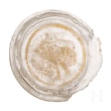 A Roman glass fragment with "Zwischengoldglas" technique from the bottom of a vessel, 3rd century A.D.