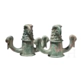 Two Roman bronze chariot body suspensions with eagle and swan heads, 2nd - 3rd century A.D.