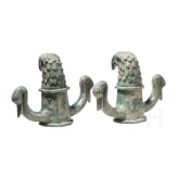 Two Roman bronze chariot body suspensions with eagle and swan heads, 2nd - 3rd century A.D.