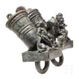Two Roman mirror-like yoke fittings with Eros on panther and satyr mask, bronze, late 1st - mid-3rd century A.D.