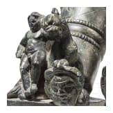 Two Roman mirror-like yoke fittings with Eros on panther and satyr mask, bronze, late 1st - mid-3rd century A.D.