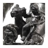 Two Roman mirror-like yoke fittings with Eros on panther and satyr mask, bronze, late 1st - mid-3rd century A.D.