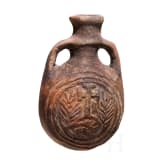 An early Byzantine pilgrim's bottle, mould-shaped ceramic, 6th - 7th century