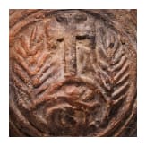 An early Byzantine pilgrim's bottle, mould-shaped ceramic, 6th - 7th century