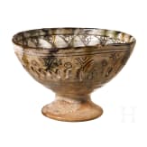 A Middle Byzantine glazed bowl with ring stand, sgraffito ware, 11th century A.D.