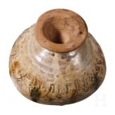 A Middle Byzantine glazed bowl with ring stand, sgraffito ware, 11th century A.D.