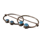 A pair of Finno-Ugric ring brooches made of silver with blue glass inlays, 10th - 11th century