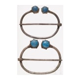 A pair of Finno-Ugric ring brooches made of silver with blue glass inlays, 10th - 11th century