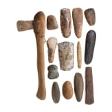 14 Neolithic stone tools, mostly hatchets, circa 4th - 3rd millennium B.C.