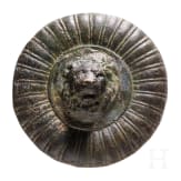 A solid bronze appliqu&eacute; with a central lion head based on an antique model, 19th century