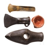 A stone axe, a flanged axe and a socketed axe, Copper Age and Bronze Age, mid-3rd millennium to 8th century B.C., plus a terra sigillata base with stamp