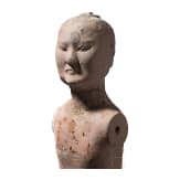 A Chinese painted clay figure of a standing nude man, Han Dynasty, circa 150 B.C.