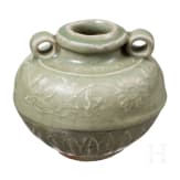 A small Chinese molded Longquan celadon vase, probably Ming Dynasty