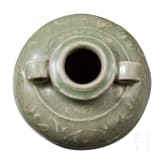 A small Chinese molded Longquan celadon vase, probably Ming Dynasty